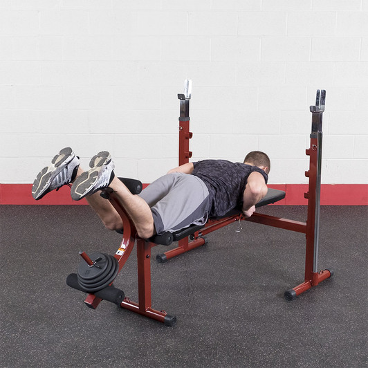 Leg Curls on the Best Fitness Olympic Weight Bench