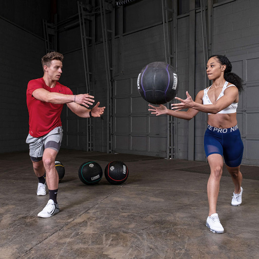 Oblique Twist Toss with the Body-Solid Tools Heavy Rubber Balls