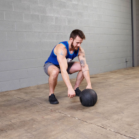 Slam Down with the Body-Solid Tools Tire Tread Slam Balls