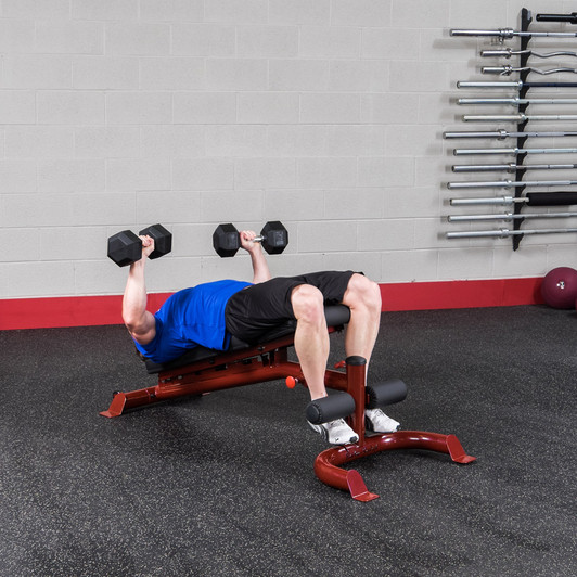 Decline Press on the Body-Solid GFID100 Adjustable Bench with optional dumbbells