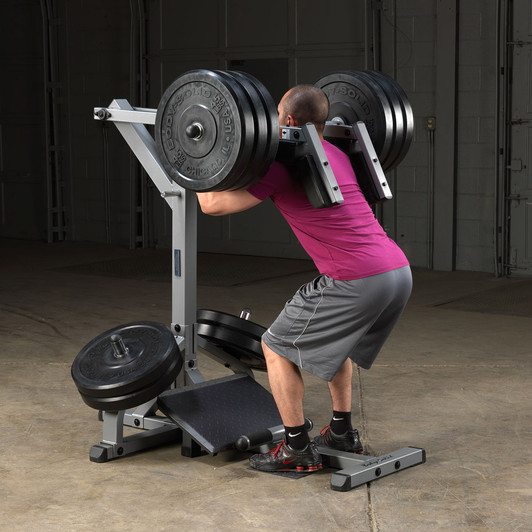 Squats on the Body-Solid Leverage Squat Calf Machine