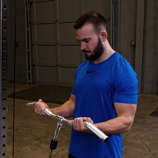 Curls with the Body-Solid Tools Aluminum Revolving Curl Bar