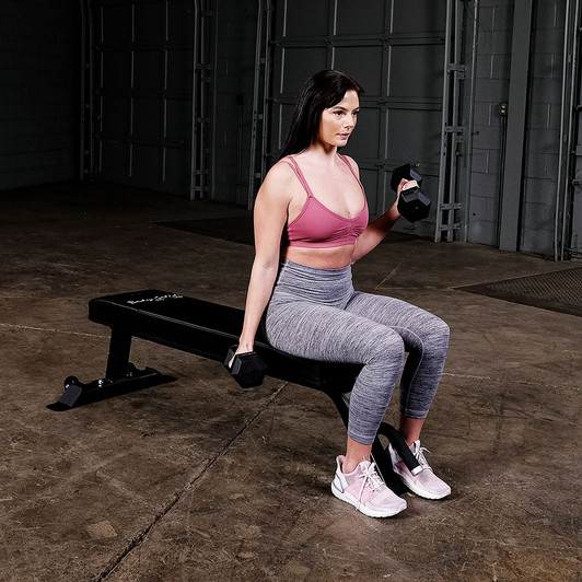 Curls on the Pro ClubLine SFB125 Flat Bench by Body-Solid