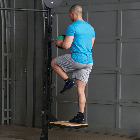 Knee up on the Pro ClubLine Plyo Step Attachment